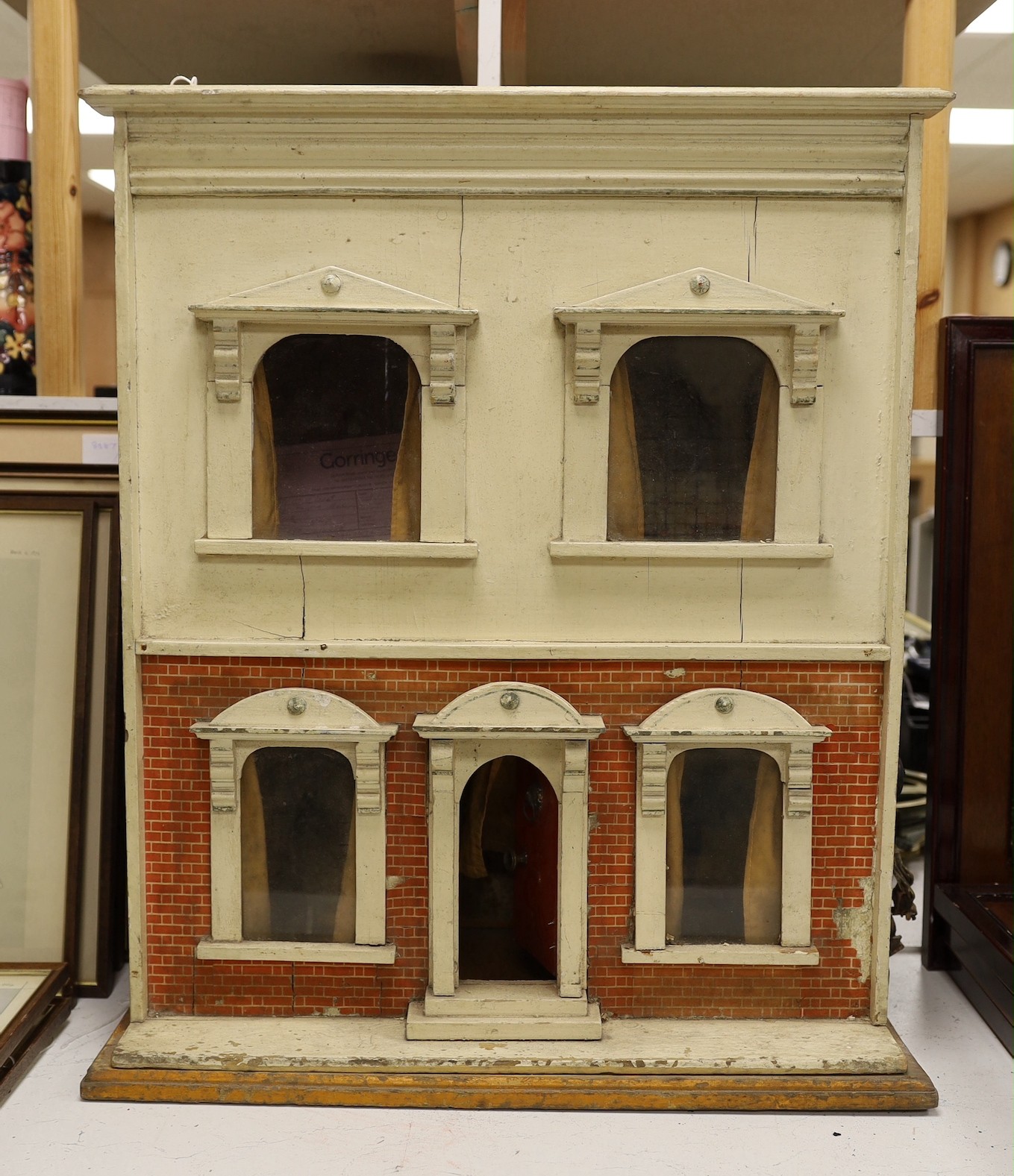 A 19th century painted doll's house, 68cm